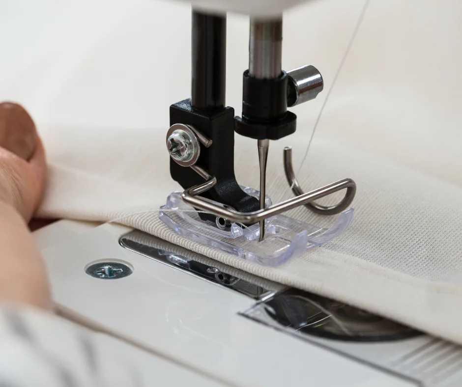 Precision garment manufacturing and embroidery process for durable corporate uniforms